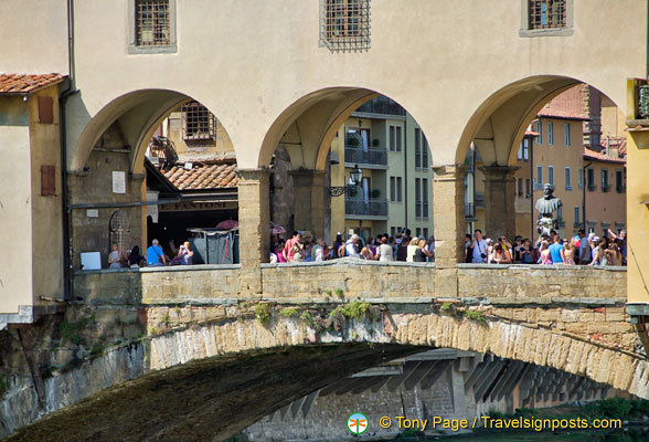 The shops on Ponte Vecchio sell jewelry, artwork and souvenirs