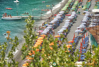 View of the colourful umbrellas on Positano beach
