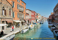 Murano's Canal Grande, lined with shops on both sides