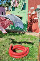 Everything's colourful in Burano, even the plastic pipe
