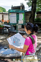 Me, checking out the Pere Lachaise map