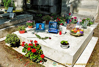 Grave of Gilbert Bécaud, known as Monsier 100,000 Volts