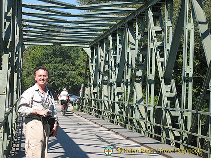 Tony crossing the bridge and back to our river-boat