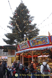 Young visitors pestering their parents for a ride