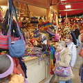 Cologne Weihnachtsmarkt stall selling colorful soft bags