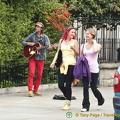 A busker in front of St John's Church
