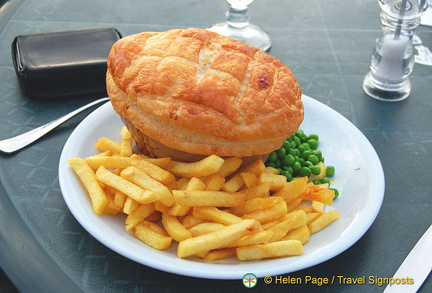 Steak and Kidney pie with potatoes and peas