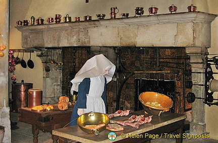 Gothic fireplace with a dual hearth and mechanical spit