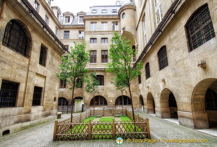 The Women's Courtyard surrounded by two floors of prison cells