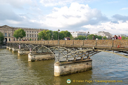 Those in love come to attach a padlock on the Pont des Arts to seal their love