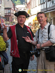 Willy Herth, Miltenberg's singing guide, trying to snare Tony for a tour. 