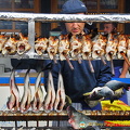 Cooked steckerlfisch kept warm over the grill