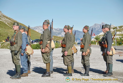 Volunteers re-enacting a change of guard ceremony