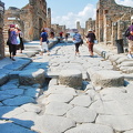 The grooves in this Pompeii street are tracks for carriages (2753 visingar) The grooves in this Pompeii street are tracks for carriages