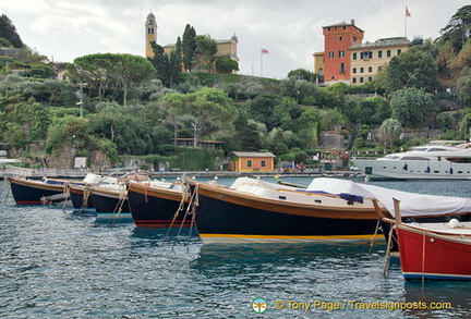 View of Portofino marina with San Giorgio church on the hill