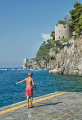 On the western side of the waterfront are two 15th century towers, Tower of Fornillo and Trasita Tower