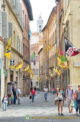 Street decorated with palio flags