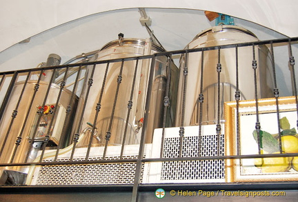 Cylinders of limoncello brewing at Limonoro