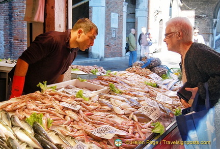 An early shopper getting the pick of the fish