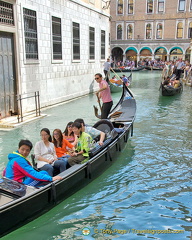 Enjoying a gondola ride during Acqua Alta