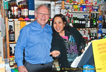 Helping the manager of Laggan Stores at the till