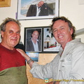 Caffetteria Montalbano's owner proudly shows pictures of Montalbano in his cafe