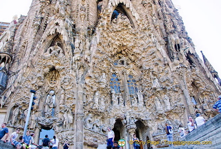 The three doorways of the Nativity facade representing Hope, Charity and Faith and the elaborate sculptures above them