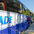 Lines of tour buses at the west facade