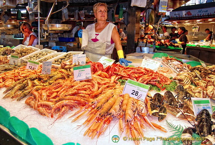 This stall sells cooked prawns and shellfish