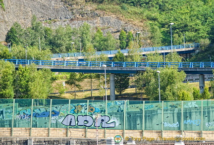 The zig-zaggy road with the blue railings look like artwork