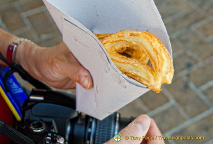 Tony trying some churros