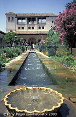 Rows of water jets on either side form graceful arches above it