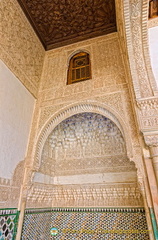 One of the walls of the Patio de los Arrayanes