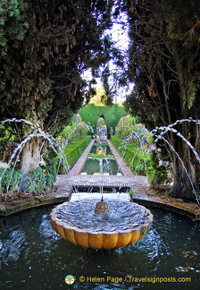 Generalife Lower Garden:  A fountain and pool amongst the conifer hedges