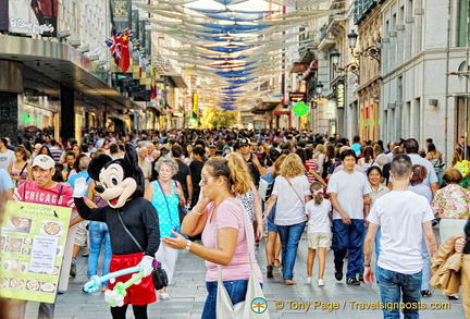 A very busy shopping street off the Puerta del Sol