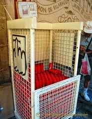 Huge basket of red candles which you can buy at Euro 1.80 each