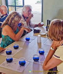 Tasting arbequina extra virgin olive oil at Basilippo