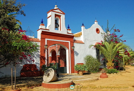 Earthy colours of Hacienda Merrha against the brilliant blue sky