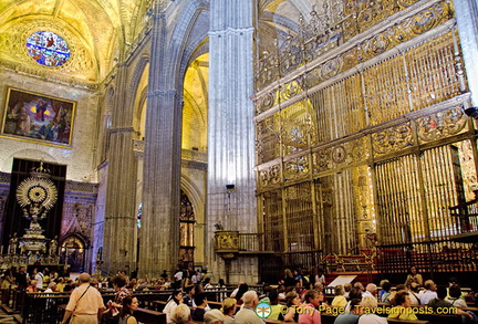 Capilla Mayor - The Retablo Mayor is behind these 16th century iron grilles