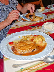 Braised pork in red wine sauce with potatoes