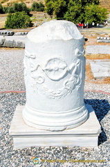 This column with two serpents is a symbol of medicine. Snakes renew their bodies by shedding skin and hence the belief that snakes have healing power.