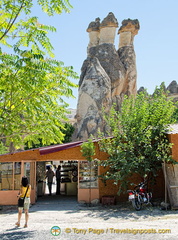 The giftshop next to the family of three fiary chimneys