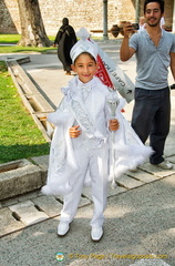 A little boy celebrating his circumcision