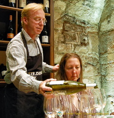 Our wine tasting presenter pours out the wine to be tasted