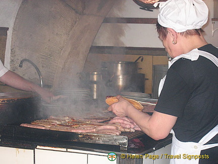 Bratwurst being cooked at Regensburg Wurstkuchl